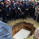 Patrick Lyoya’s mother, Dorcas, right, mourns as they lay her son to rest at Resurrection Cemetery in Wyoming, Mich. on Friday, April 22, 2022. Lyoya, 26, a Black man was killed April 4, 2022 by a white Grand Rapids, Mich. police officer.